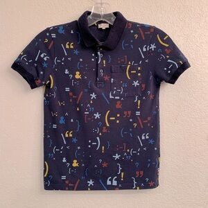 Boys Paul Smith Junior navy polo with multi color punctuation marks print